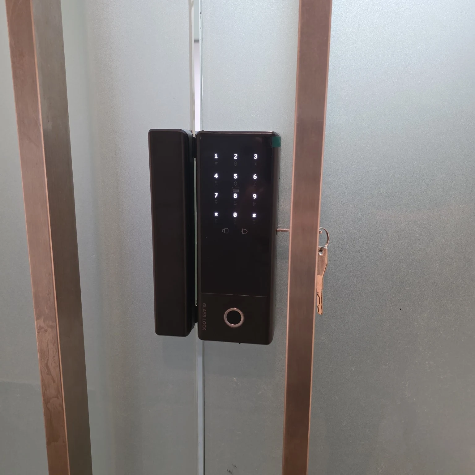 Infinite GD3 digital glass door lock installed for our client at Woodsquare